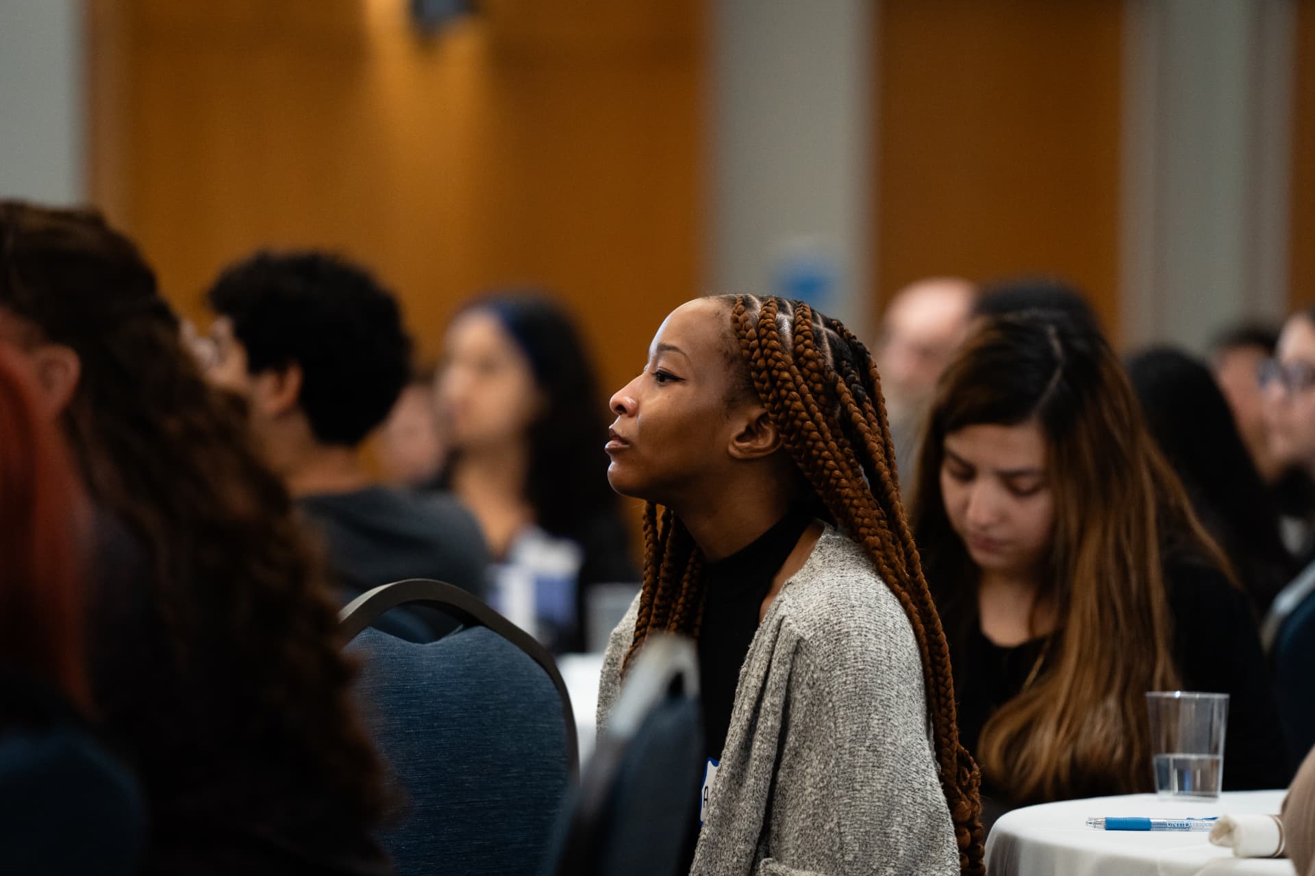 A student listening closely during The Gold Chair program